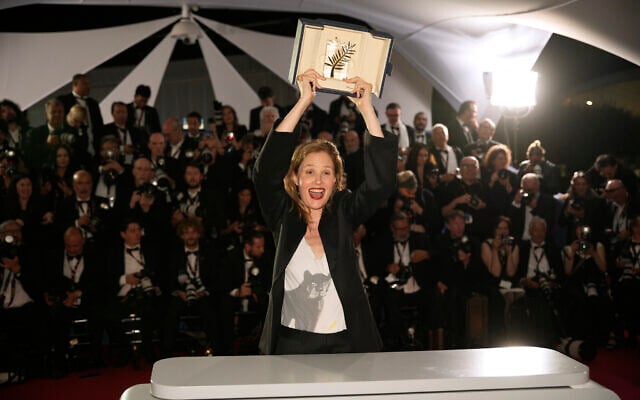 Justine Triet, winner of the Palme d'Or for 'Anatomy of a Fall,' poses for photographers during a photo call following the awards ceremony at the 76th international film festival, Cannes, southern France, May 27, 2023. (AP Photo/Daniel Cole) Justine Triet, winner of the Palme d'Or for 'Anatomy of a Fall,' poses for photographers during a photo call following the awards ceremony at the 76th international film festival, Cannes, southern France, May 27, 2023. (AP Photo/Daniel Cole)