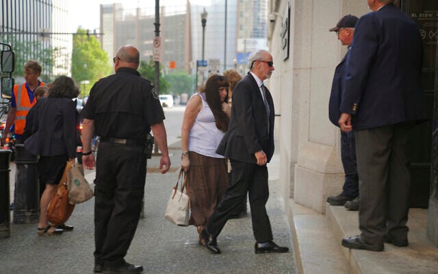Rabbi Jeffrey Myers, third from right, of the Tree of Life, enters the Federal courthouse in Pittsburgh for the first day of trial for Robert Bowers, the suspect in the 2018 synagogue massacre, on May 30, 2023, in Pittsburgh. (AP Photo/Jessie Wardarski) Rabbi Jeffrey Myers, third from right, of the Tree of Life, enters the Federal courthouse in Pittsburgh for the first day of trial for Robert Bowers, the suspect in the 2018 synagogue massacre, on May 30, 2023, in Pittsburgh. (AP Photo/Jessie Wardarski)