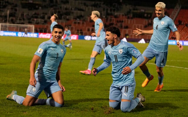 Israel's Anan Khalaili, left, celebrates with teammate Hamza Shibli, right, after scoring their team's first goal against Uzbekistan during a FIFA U-20 World Cup round of 16 soccer match at the Malvinas Argentinas stadium in Mendoza, Argentina, May 30, 2023. (AP Photo/Ricardo Mazalan) Israel's Anan Khalaili, left, celebrates with teammate Hamza Shibli, right, after scoring their team's first goal against Uzbekistan during a FIFA U-20 World Cup round of 16 soccer match at the Malvinas Argentinas stadium in Mendoza, Argentina, May 30, 2023. (AP Photo/Ricardo Mazalan)