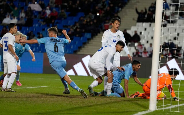 Israel's Anan Khalaili, second right, celebrates after scoring his team's first goal against Uzbekistan during a FIFA U-20 World Cup round of 16 soccer match in Mendoza, Argentina, May 30, 2023. (AP/Ricardo Mazalan) Israel's Anan Khalaili, second right, celebrates after scoring his team's first goal against Uzbekistan during a FIFA U-20 World Cup round of 16 soccer match in Mendoza, Argentina, May 30, 2023. (AP/Ricardo Mazalan)