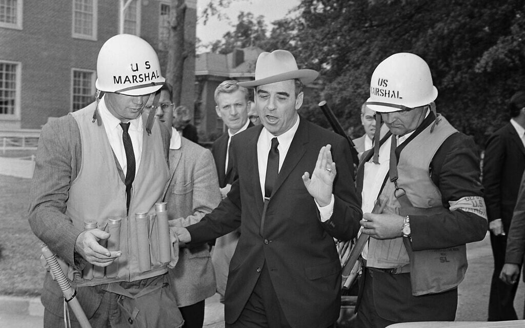 Edwin A. Walker under the custody of marshals on campus of Ole Miss in Oxford, Mississippi, October 1, 1962. (AP Photo) Edwin A. Walker under the custody of marshals on campus of Ole Miss in Oxford, Mississippi, October 1, 1962. (AP Photo)