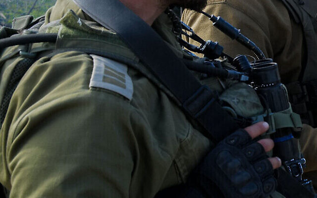 Illustrative: An IDF combat soldier with the rank of captain is seen during a drill in the Golan Heights, on January 10, 2023. (Michael Giladi/Flash90) Illustrative: An IDF combat soldier with the rank of captain is seen during a drill in the Golan Heights, on January 10, 2023. (Michael Giladi/Flash90)