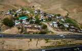 View of the illegal Bedouin village Khan al-Ahmar, just off of Road 1 in the West Bank, February 2, 2023. (Yonatan Sindel/Flash90)