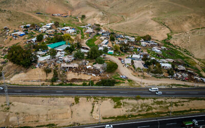 View of the illegal Bedouin village Khan al-Ahmar, just off of Road 1 in the West Bank, February 2, 2023. (Yonatan Sindel/Flash90)