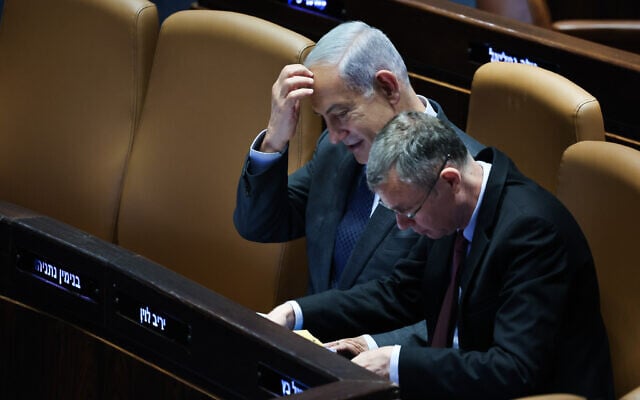 Prime Minister Benjamin Netanyahu and Justice Minister Yariv Levin at the opening of the summer session of the Knesset, on May 1, 2023. (Yonatan Sindel/Flash90) Prime Minister Benjamin Netanyahu and Justice Minister Yariv Levin at the opening of the summer session of the Knesset, on May 1, 2023. (Yonatan Sindel/Flash90)