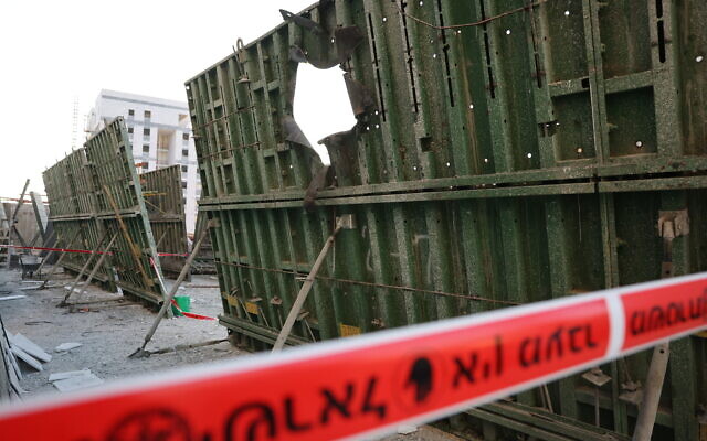 The site where a rocket fired from Gaza hit a construction site in the southern city of Sderot, May 2, 2023. (Yonatan Sindel/FLASH90)