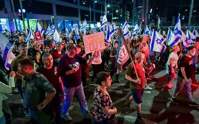 Protesters march in Bnei Brak against the billions in funds provided to ultra-Orthodox parties in the state budget, on May 17, 2023. (Avshalom Sassoni/Flash90)