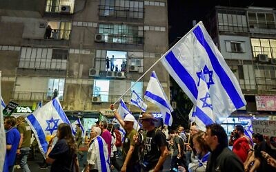 Protesters march in Bnei Brak against the billions in funds provided to ultra-Orthodox parties in the state budget, on May 17, 2023. (Avshalom Sassoni/Flash90)