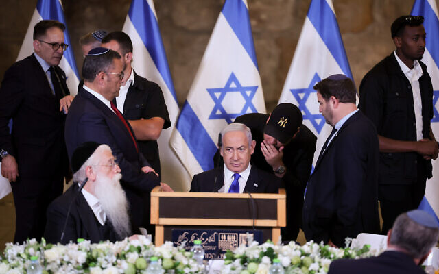Prime Minister Benjamin Netanyahu leads the weekly cabinet meeting at the Western Wall tunnels on May 21, 2023 (Yonatan Sindel/Flash90) Prime Minister Benjamin Netanyahu leads the weekly cabinet meeting at the Western Wall tunnels on May 21, 2023 (Yonatan Sindel/Flash90)