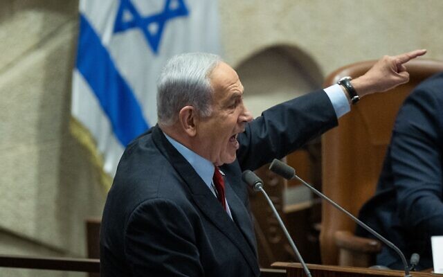 Prime Minister Benjamin Netanyahu addresses the Knesset during a vote on the state budget in Jerusalem, May 23, 2023. (Yonatan Sindel/Flash90)