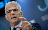 Opposition Leader Yair Lapid speaks at the Eli Hurvitz Conference on Economy and Society, hosted in Jerusalem by Israel Democracy Institute, May 31, 2023. (Yonatan Sindel/Flash90)