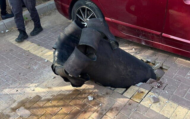 Shrapnel from a projectile in a parking lot in the southern city of Netivot, after terrorists in the Gaza Strip fired a rocket barrage at Israel, May 13, 2023. (Twitter: used in accordance with Clause 27a of the Copyright Law) Shrapnel from a projectile in a parking lot in the southern city of Netivot, after terrorists in the Gaza Strip fired a rocket barrage at Israel, May 13, 2023. (Twitter: used in accordance with Clause 27a of the Copyright Law)