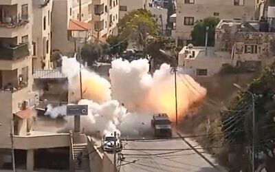 An explosive device is set off near an IDF convoy leaving the West Bank city of Nablus, May 9, 2023. (Screenshot: Twitter)