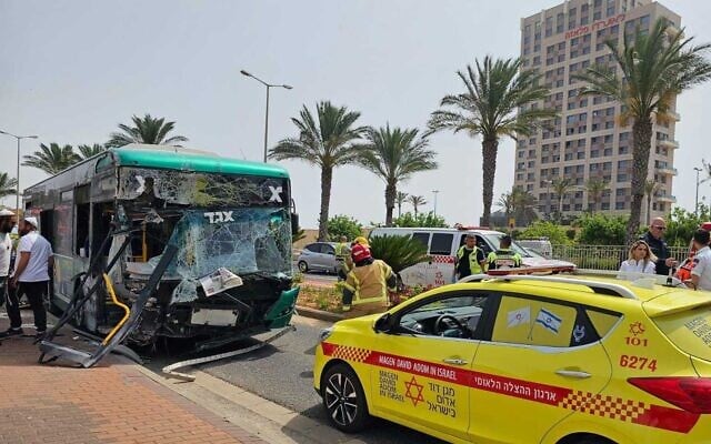 A bus that crashed into a wall in Haifa on May 22, 2023. (Magen David Adom) A bus that crashed into a wall in Haifa on May 22, 2023. (Magen David Adom)