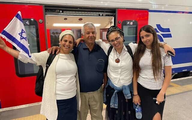 The Karadi family arrives in Jerusalem on May 18, 2023, to participate in the annual Jerusalem Day Flag March. (Carrie Keller-Lynn/Times of Israel)