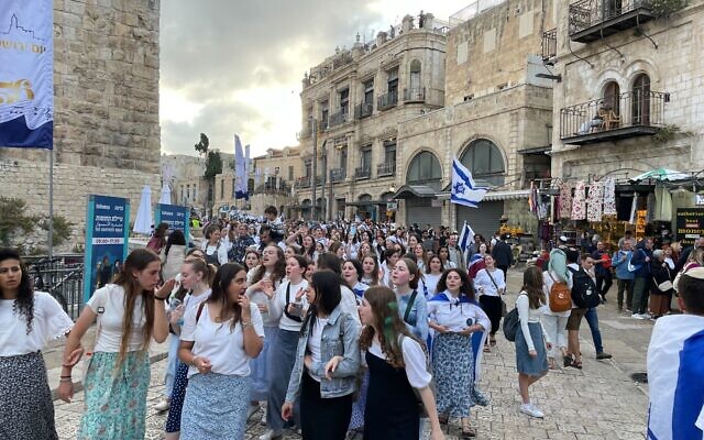 Jerusalem Day Flag March participants walk through the Jaffa Gate into the Old City on May 18, 2023. (Carrie Keller-Lynn/Times of Israel) Jerusalem Day Flag March participants walk through the Jaffa Gate into the Old City on May 18, 2023. (Carrie Keller-Lynn/Times of Israel)
