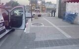 Screen capture from video of the scene where a man was shot dead in Lod, May 17, 2023. (Israel Police)