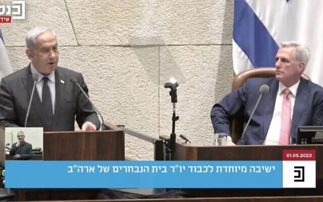 Prime Minister Benjamin Netanyahu addresses the Knesset plenum as US House Speaker Kevin McCarthy looks on, May 1, 2023. (Knesset TV. Used in accordance with Clause 27a of the Copyright Law)