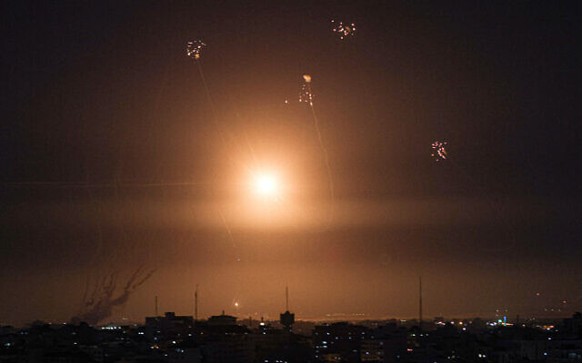 Israel's Iron Dome air defense system intercepts rockets launched from Gaza, on May 10, 2023. (Mahmud Hams/AFP) Israel's Iron Dome air defense system intercepts rockets launched from Gaza, on May 10, 2023. (Mahmud Hams/AFP)