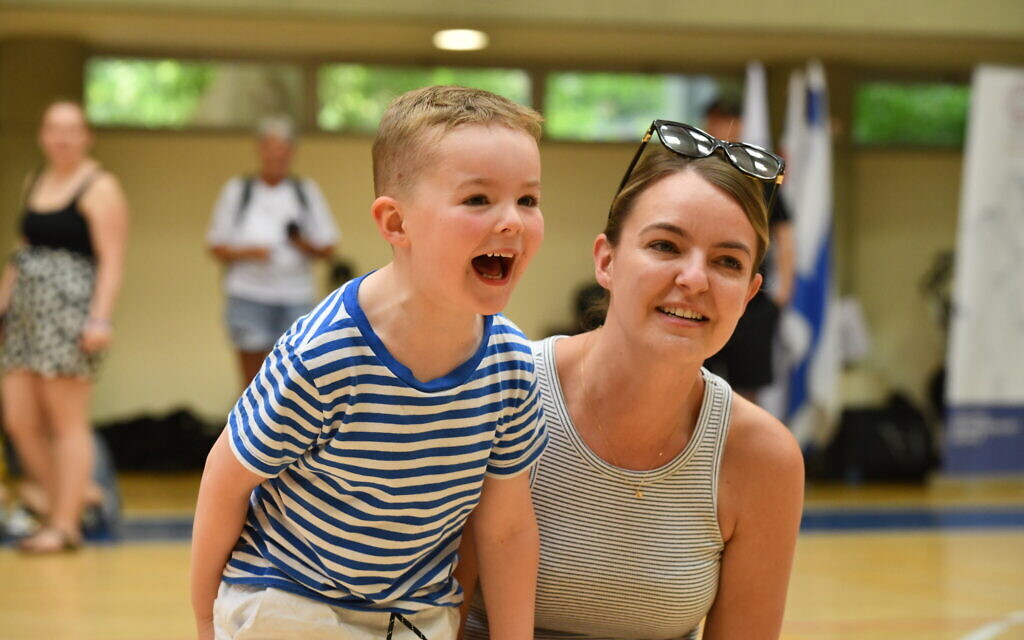 Families cheer on the participants in the 3rd Veterans Games in Tel Aviv on May 29, 2023. (courtesy Beit HaLohem UK)