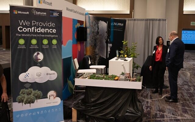 Anat Halgoa Solomon, co-founder and CEO of Saturas showcases the Israeli startup's smart sensor-based precision irrigation system at Microsoft's booth at the World Agri-Tech Innovation Summit in San Francisco in March, 2023. (Courtesy) Anat Halgoa Solomon, co-founder and CEO of Saturas showcases the Israeli startup's smart sensor-based precision irrigation system at Microsoft's booth at the World Agri-Tech Innovation Summit in San Francisco in March, 2023. (Courtesy)