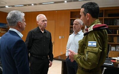File - Defense Minister Yoav Gallant (2nd-L) meets IDF Chief of Staff Herzi Halevi (R), Shin Bet chief Ronen Bar (2nd-R) and Mossad head David Barnea at his office in Tel Aviv on May 9, 2023. (Ariel Hermoni/ Defense Ministry/File)