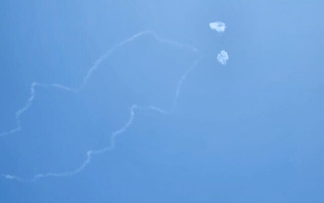 Smoke following interceptions by the Iron Dome air defense system are seen in the sky above Ashdod on May 13, 2023 (Courtesy) Smoke following interceptions by the Iron Dome air defense system are seen in the sky above Ashdod on May 13, 2023 (Courtesy)