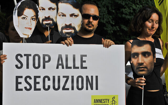 Iranian students and Amnesty International members hold a banner reading 'Stop executions' during demonstration in front of Iranian Embassy against the arrests of political leaders during post-election protests in Tehran in June 2009 (Andreas Solaro / AFP) Iranian students and Amnesty International members hold a banner reading 'Stop executions' during demonstration in front of Iranian Embassy against the arrests of political leaders during post-election protests in Tehran in June 2009 (Andreas Solaro / AFP)