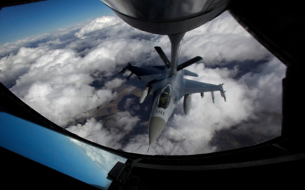 A US Air Force F-16 refuels in mid-flight from a KC-135 Stratotanker during a Red Flag exercise over The Nevada Test and Training Range on February 10, 2014. (John Locher/Las Vegas Review-Journal via AP) A US Air Force F-16 refuels in mid-flight from a KC-135 Stratotanker during a Red Flag exercise over The Nevada Test and Training Range on February 10, 2014. (John Locher/Las Vegas Review-Journal via AP)