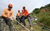 Members of the Israel Police Volunteer Rescue Unit work to rescue a 60-year-old man who fell while hiking near Nahal Sa'ar on May 5, 2023. (Israel Police Volunteer Rescue Unit)