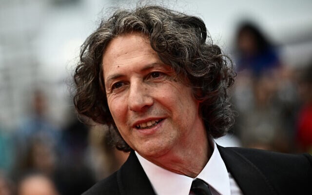 British director Jonathan Glazer arrives for the screening of his film 'The Zone of Interest' during the 76th edition of the Cannes Film Festival in Cannes, southern France, on May 19, 2023. (Loic Venance/AFP) British director Jonathan Glazer arrives for the screening of his film 'The Zone of Interest' during the 76th edition of the Cannes Film Festival in Cannes, southern France, on May 19, 2023. (Loic Venance/AFP)