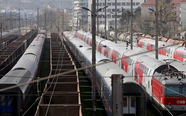 Trains parked at a station in Vienna, Austria, March 27, 2020. (AP Photo/Ronald Zak, File) Trains parked at a station in Vienna, Austria, March 27, 2020. (AP Photo/Ronald Zak, File)