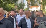 Religious Zionism MK Simcha Rothman leaving the Hebrew Book Week Fair amid anti-judicial overhaul protests at Sarona Market, Tel Aviv, June 18, 2023. (Twitter video screenshot: used in accordance with Clause 27a of the Copyright Law)