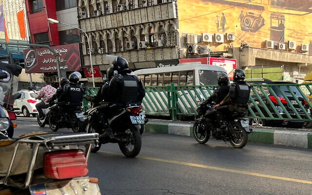 A picture obtained by AFP outside Iran reportedly shows Iranian police patrolling in the capital Tehran on October 8, 2022. (AFP) A picture obtained by AFP outside Iran reportedly shows Iranian police patrolling in the capital Tehran on October 8, 2022. (AFP)