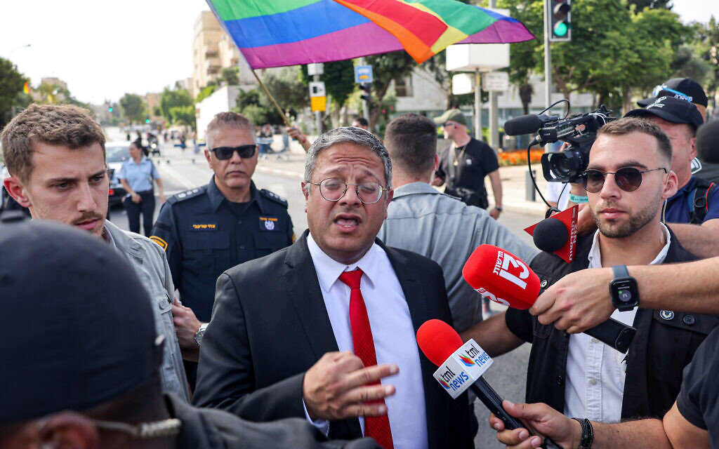 National Security Minister Itamar Ben-Gvir speaks to the press as he visits the annual Jerusalem Pride Parade and the protest against it, in Jerusalem on June 1, 2023. (Photo by Menahem KAHANA / AFP)