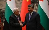 File - Palestinian Authority President Mahmoud Abbas (left) shakes hands with China's President Xi Jinping after a signing ceremony at the Great Hall of the People in Beijing on June 14, 2023. (Jade GAO / POOL / AFP)