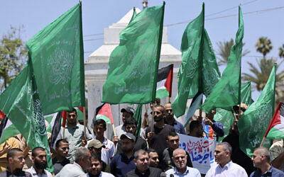 Supporters of the Palestinian group Hamas gather during a protest in Gaza City, on June 19, 2023. (MAHMUD HAMS / AFP)