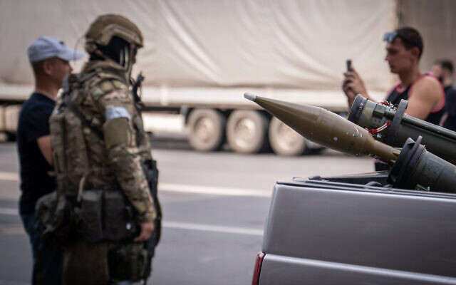 This photograph taken on June 24, 2023, shows two grenade launchers in a car as local residents pose for a photograph with a member of the Wagner group in the Russian city of Rostov-on-Don. (Roman Romokhov/AFP) This photograph taken on June 24, 2023, shows two grenade launchers in a car as local residents pose for a photograph with a member of the Wagner group in the Russian city of Rostov-on-Don. (Roman Romokhov/AFP)