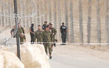 IDF chief Herzi Halevi walks with other military and police officials near the site where an Egyptian policeman infiltrated into Israel, June 3, 2023. (Israel Defense Forces)