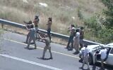 Illustrative: Screenshot from a video of settlers firing at the West Bank village of Umm Safa on June 24, 2023. (Twitter video screenshot: Used in accordance with Clause 27a of the Copyright Law)