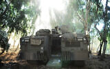 A 'Namer' APC is seen during a drill held by the Golani Brigade in the Golan Heights,  August 22, 2012. (Pvt. Tal Manor/Israel Defense Forces, file)