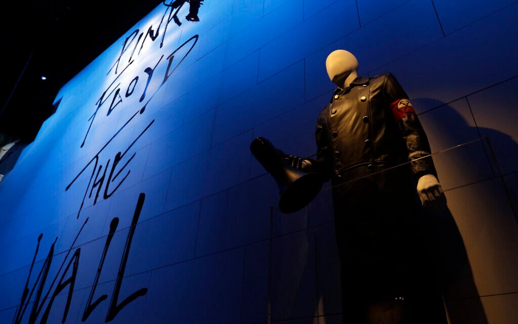 A mannequin holding a megaphone is displayed at 'The Pink Floyd Exhibition: Their Mortal Remains,' in Rome, January 16, 2018. (AP Photo/Gregorio Borgia)