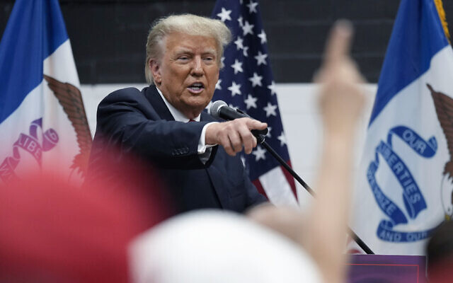 US former president Donald Trump visits with campaign volunteers at the Grimes Community Complex Park, Thursday, June 1, 2023, in Des Moines, Iowa. (AP Photo/Charlie Neibergall) US former president Donald Trump visits with campaign volunteers at the Grimes Community Complex Park, Thursday, June 1, 2023, in Des Moines, Iowa. (AP Photo/Charlie Neibergall)