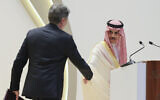 US Secretary of State Antony Blinken, left, shakes hands with Saudi Arabia's Foreign Minister Prince Faisal bin Farhan during a joint news conference at the Intercontinental Hotel in Riyadh, Saudi Arabia, June 8, 2023. (Ahmed Yosri/Pool Photo via AP)