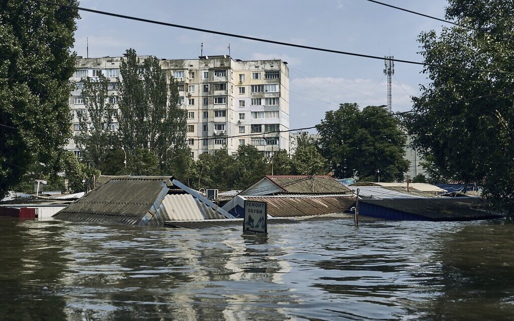 A view of a flooded neighborhood in Kherson, Ukraine, June 8, 2023. (Libkos/AP)