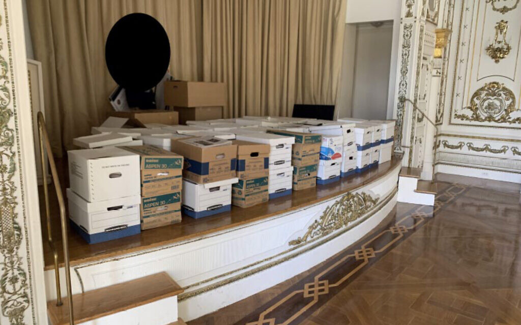 This image, contained in the indictment against former US president Donald Trump, shows boxes of records being stored on the stage in the White and Gold Ballroom at Trump's Mar-a-Lago estate in Palm Beach, Florida. (Justice Department via AP) This image, contained in the indictment against former US president Donald Trump, shows boxes of records being stored on the stage in the White and Gold Ballroom at Trump's Mar-a-Lago estate in Palm Beach, Florida. (Justice Department via AP)
