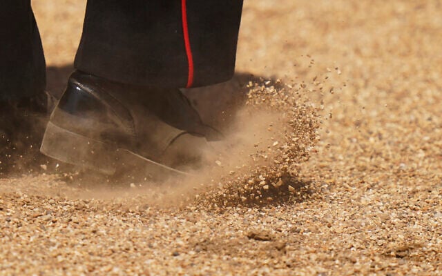 A view of gravel as a soldier marches during the Colonel's Review, the final rehearsal of the Trooping the Colour, the King's annual birthday parade, at Horse Guards Parade in London, June 10, 2023. (AP Photo/Alberto Pezzali) A view of gravel as a soldier marches during the Colonel's Review, the final rehearsal of the Trooping the Colour, the King's annual birthday parade, at Horse Guards Parade in London, June 10, 2023. (AP Photo/Alberto Pezzali)