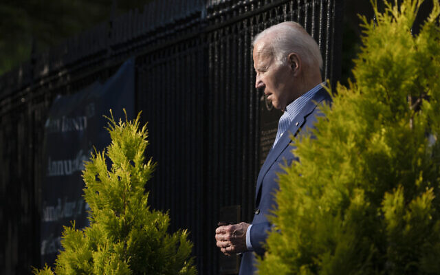 US President Joe Biden leaves Holy Trinity Catholic Church in the Georgetown section of Washington, after attending Mass, Saturday, June 10, 2023. (AP Photo/Manuel Balce Ceneta)
