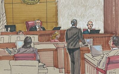 In this courtroom sketch, Erich Smith testifies June 13, 2023, in Pittsburgh, in the federal trial of Robert Bowers, accused of shooting to death 11 worshippers in a synagogue in 2018. (AP Photo/David Klug)