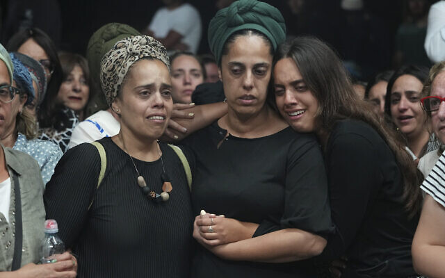 Relatives of Harel Masood, 21, who was killed in a terror attack near the West Bank settlement of Eli, mourn during his funeral in Yesodot, June 20, 2023. (AP Photo/Tsafrir Abayov) Relatives of Harel Masood, 21, who was killed in a terror attack near the West Bank settlement of Eli, mourn during his funeral in Yesodot, June 20, 2023. (AP Photo/Tsafrir Abayov)
